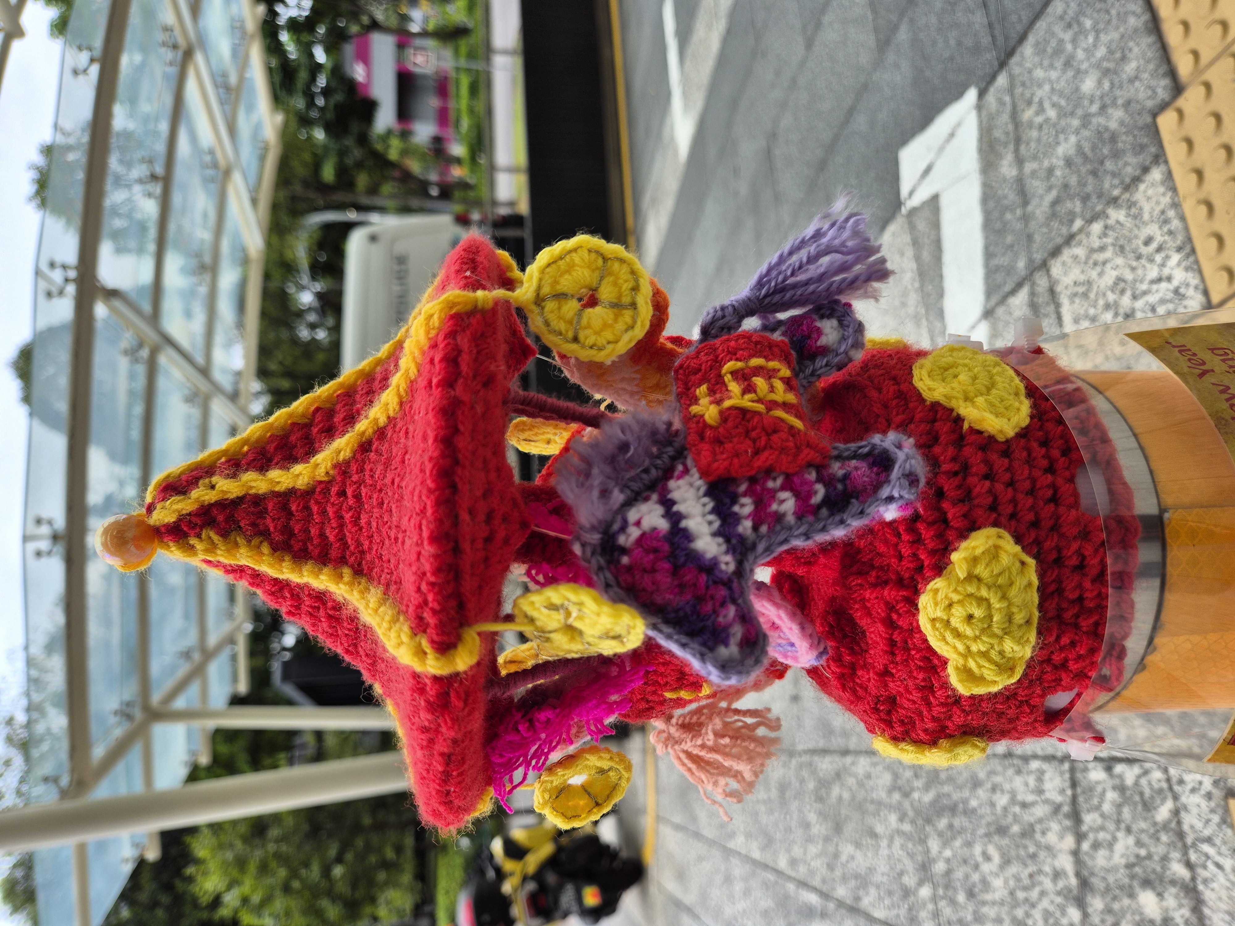 Crocheted carousel of horses from the CNY Toppers installation of 2026.